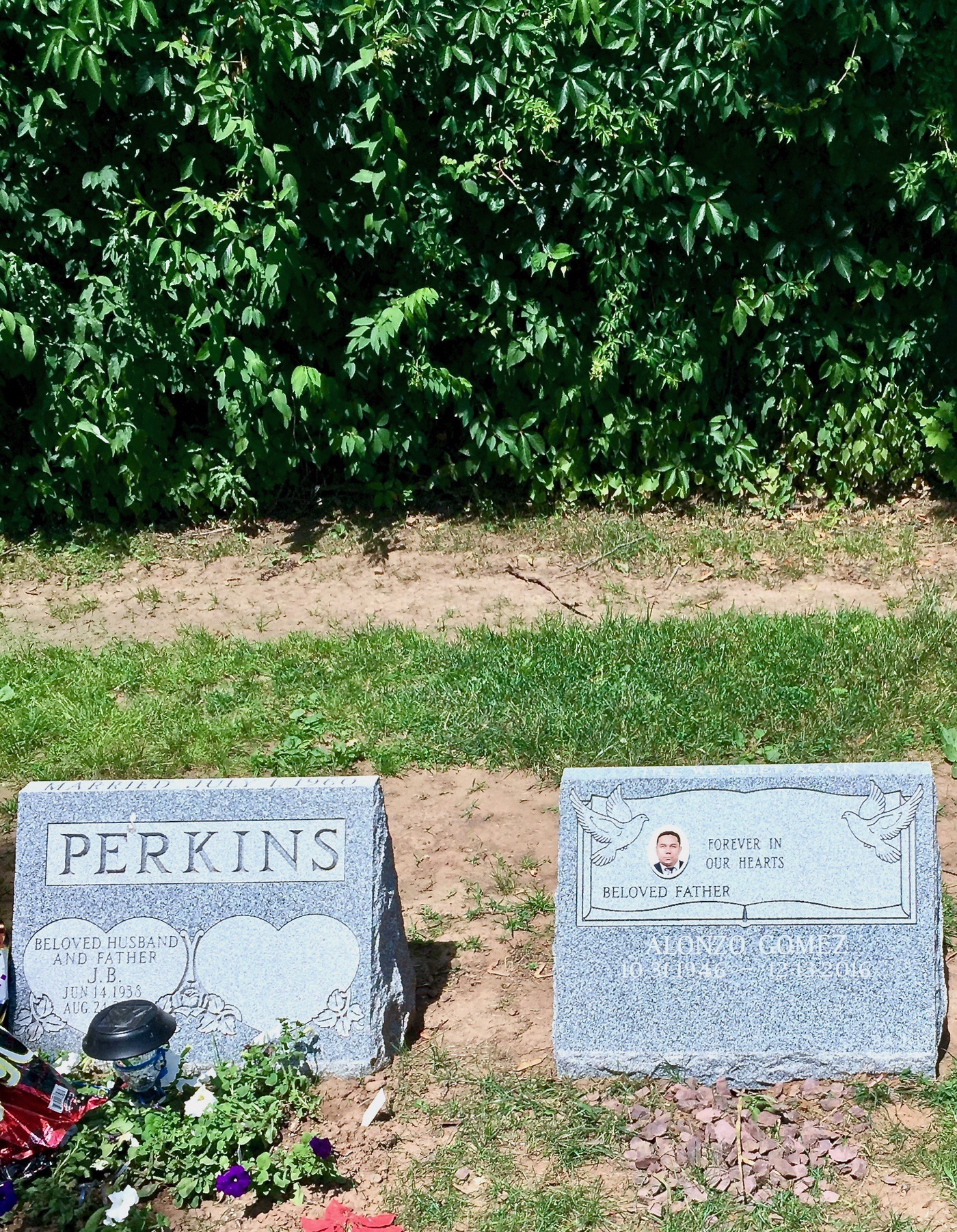 Custom-lettered slant granite monument